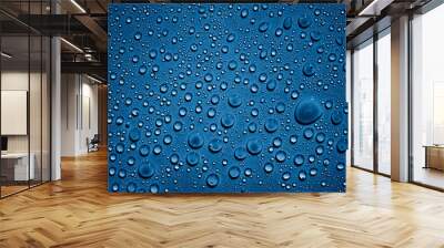 Water droplets on blue background Wall mural