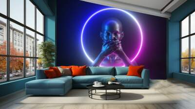 3d render, abstract neon light background with mannequin body parts. Female head, hands, closed mouth. Round frame. Social metaphor: voiceless, speechless, suppressing the truth, hiding the secret Wall mural