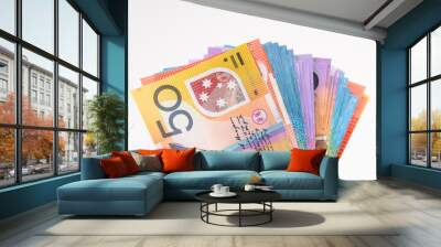 Australian cash notes held in a hand with white isolated background Wall mural