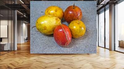 Passion fruits on granite background Wall mural