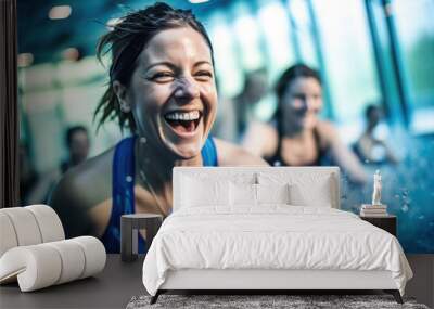 Active women enjoying aqua fit class in a pool Wall mural