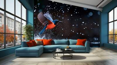  A blue-orange bird flies over water, spreading its wings Wall mural