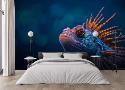  A detailed view of a blue-orange fish against a softly blurred background, with a clear blue sky above Wall mural