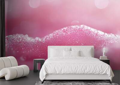  A tight shot of a pink and white backdrop adorned with numerous water droplets atop a pink surface Wall mural