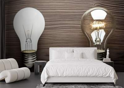 Two light bulbs on a wooden surface. Wall mural