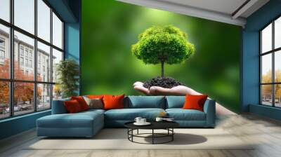 green tree on hand green business ideas Finance and Investment for Sustainability and Carbon Credit Wall mural