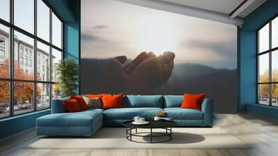 Human hands open their palms to worship and pray to God.  Faith in God, Love, Hope, Faith in God  dedication to god Wall mural