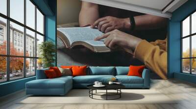 Men and women are studying the same Bible. bible background	
 Wall mural