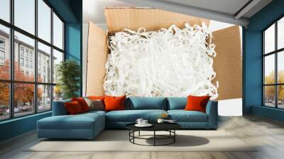 White shredded paper in cardboard box. Wall mural