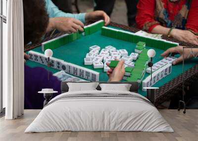 people playing mahjong in a tea garden in china Wall mural