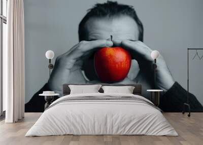 a man with a apple Wall mural