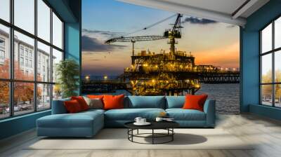 Silhouette of oil production platform during sunset Wall mural