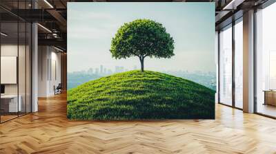 A tree is growing on a hill in the middle of a city Wall mural