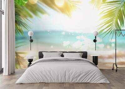 Beautiful blurred background of a sandy tropical beach and sea with palm leaves on a sunny summer day Wall mural