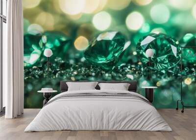 Close-up shot of emerald green gemstones on abstract background. Wall mural