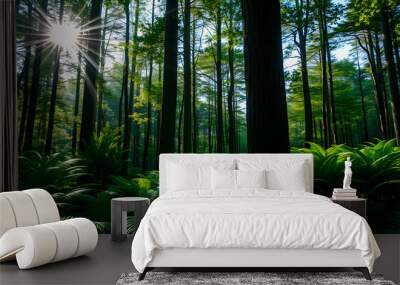 green forest with sun and rays of light in summer, nature series Wall mural