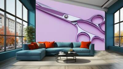 A pair of scissors with worn handles, against a soft lavender background. Wall mural