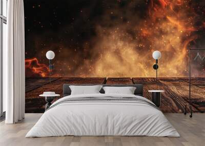 Wooden table with fire burning. wooden table with Fire burning at the edge of the table, fire particles, sparks, and smoke in the air, with fire flames on a dark background to display products Wall mural