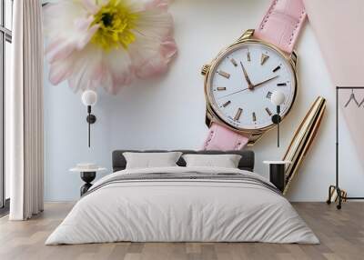  a pink watch, a watch,  a pink watch, three pens., pens Wall mural