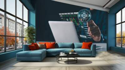 Businessman holding a magnifying glass with Artificial Intelligence (AI) in the futuristic business, Magnifying glass search of investing and stock market over a graph chart Wall mural