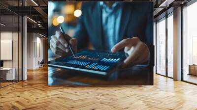 Businessman uses digital tablet to analyze and calculate financial data with economic growth graph, business strategy and planning. Wall mural