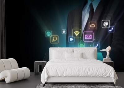 Touch screen tablet with cloud of colorful application icons Wall mural