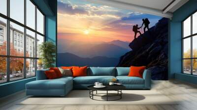 Hiker helping friend reach the mountain, Holding hands and walking up the mountain Wall mural