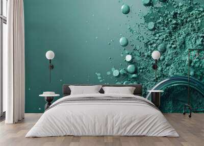 Vibrant teal and green powder explosion creating a dynamic abstract digital art background texture  Chaotic fluid motion and scattering particles in a minimalist modern and futuristic style Wall mural