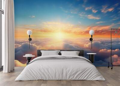 Beautiful sunrise sky above clouds with dramatic light in the morning. Wall mural