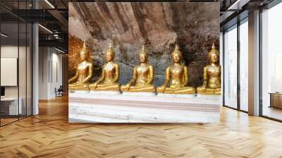 Sculptures of a seated Buddha at Wat Phra Phutta Chai, Saraburi province. Wall mural