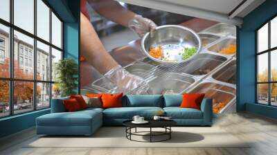 the cook puts pieces of vegetables for salad in a bowl. tray with assorted for salad in the window of a fast food restaurant Wall mural