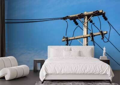 Electric Pole Power Lines And Wires With Blue Sky Background Wall mural