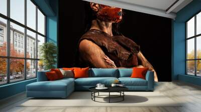 Portrait of a murderous savage wearing a leather mask, Wall mural