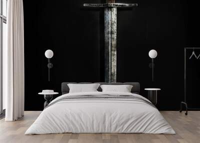 Worn Sword with Rustic Texture on Black Background
 Wall mural