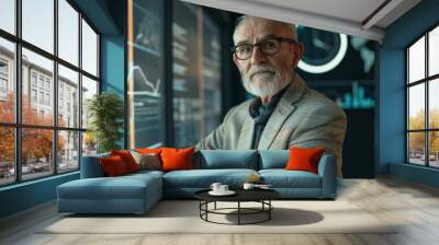 Senior business man with glasses standing in meeting room with market trend strategy on holographic screen. Wall mural