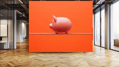 Piggy bank on a tightrope, balance between wealth and poverty, financial risk, Tightrope piggy bank, economic balance concept Wall mural