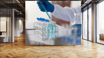 Scientists work with in vitro reagents in laboratories and draw conclusions from their research. Wall mural