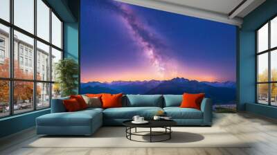 A vast starry night sky over the Swiss Alps, the Milky Way clearly visible, stars twinkling brightly above the dark mountain peaks, awe-inspiring and tranquil. Wall mural