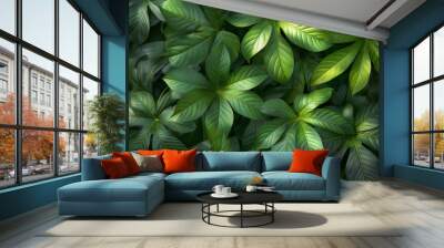 A lush green plant with many leaves and some flowers Wall mural