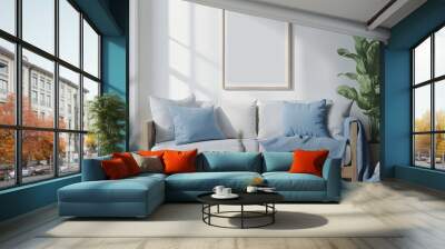 Cozy composition of stylish living room interior with mock-up poster frame, modular sofa, wooden coffee table, blue pillows, slippers, plant, and personal accessories. Home decor template Wall mural