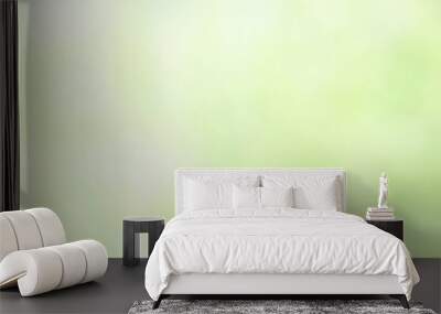 Background leaves on a light green background mixed with white. Wall mural