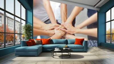 stock photo id: 631261046in selective focus of business group hands together joining teamwork concep Wall mural