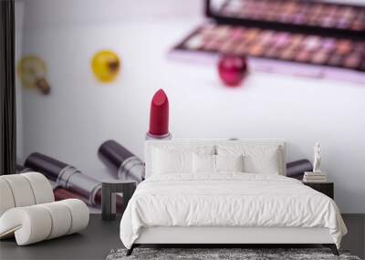 The colorful lipstick put on white background Wall mural