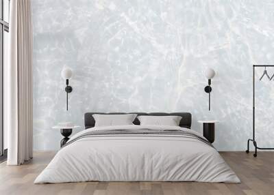 White water with ripples on the surface. Defocus blurred transparent white colored clear calm water surface texture with splashes and bubbles. Water waves with shining pattern texture background. Wall mural