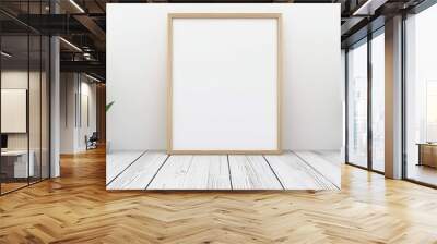 Minimalist interior scene featuring a blank picture frame and green plants on a wooden floor. Wall mural