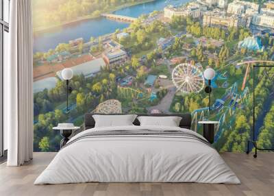 Top view of the amusement park with a ferris wheel and roller coaster Wall mural