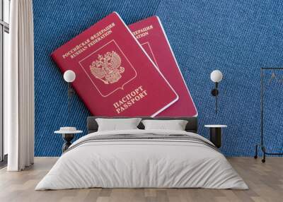 Two Russian passports on a blue textile background Wall mural