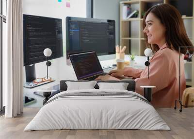 Asian female programmer working at at modern office. Developing programming. Wall mural