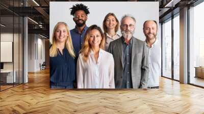 Diverse group of HR professionals in a team photo. Wall mural