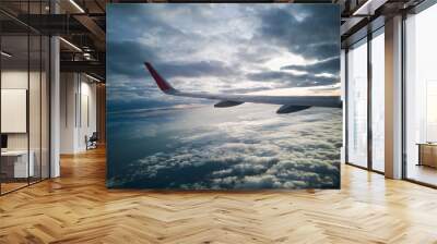 Sky and cloud as seen through window of an aircraft Wall mural